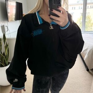 Vintage black and blue Carolina panthers quarter zip